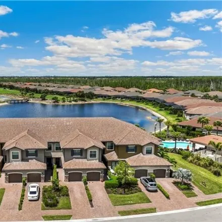 Rent this 2 bed condo on Montelanico Loop in Collier County, FL 34119