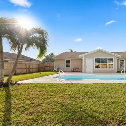 Buy this 3 bed house on 775 Southwest Hibiscus Street in Port Saint Lucie, FL 34983