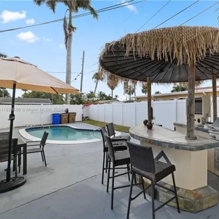 Rent this 3 bed house on Northeast 51st Street in Fairlawn, Deerfield Beach