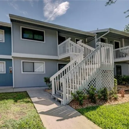Buy this 2 bed condo on Lake Trail Fountain in Lake Loop, Manatee County