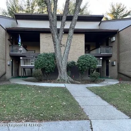 Rent this 2 bed condo on Pine Brook Golf Course in Covered Bridge Boulevard, Manalapan Township