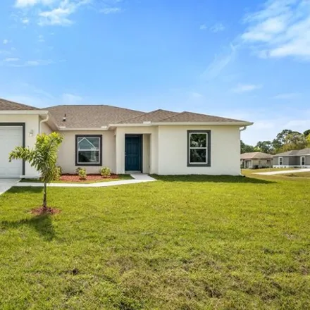 Buy this 4 bed house on 1342 Waffle Street Southeast in Palm Bay, FL 32909