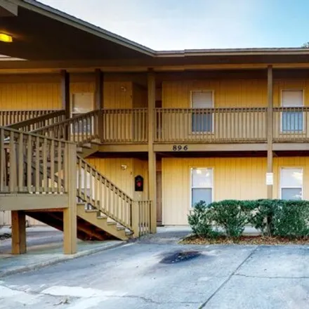 Rent this 2 bed apartment on 895 Silverwood Unit 3 in Fort Walton Beach, Florida