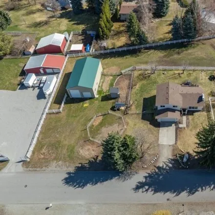 Buy this 4 bed house on 1249 South Timberlane Drive in Spokane Valley, WA 99037