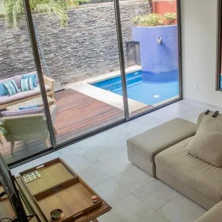 Rent this 4 bed house on unnamed road in 77534 Cancún, ROO