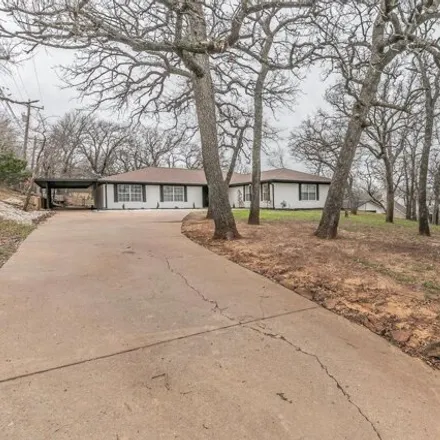 Buy this 4 bed house on 114 Drover Drive in Tarrant County, TX 76244