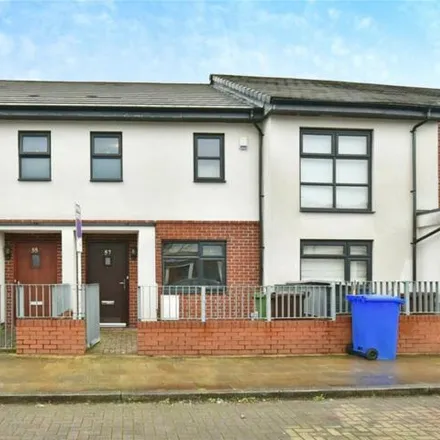 Buy this 2 bed townhouse on The Divine Mercy Roman Catholic Primary School in Blue Moon Way, Manchester