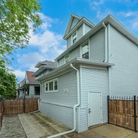 Buy this 4 bed house on 923 N Lockwood Ave in Chicago, Illinois