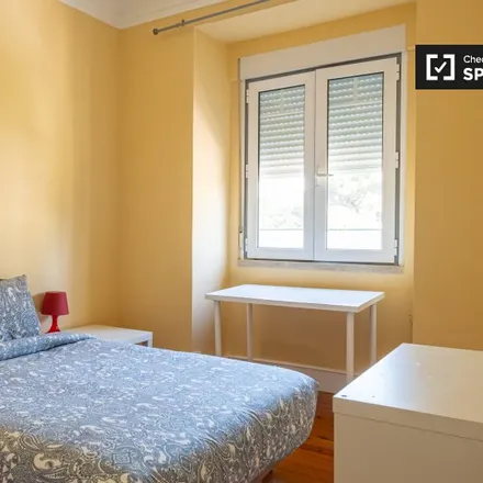 Rent this 6 bed room on Pavilhão do Jardim Sul in Avenida Rovisco Pais, 1000-268 Lisbon