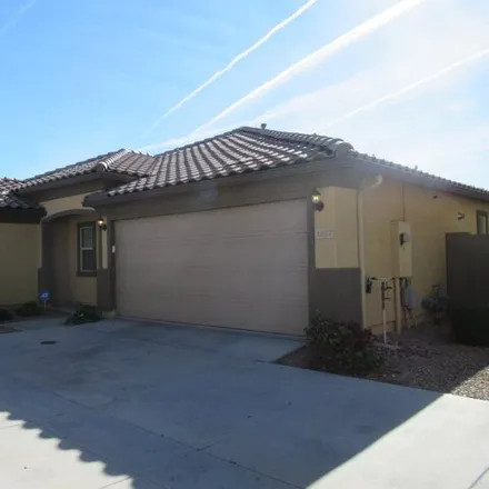 Rent this 3 bed house on 1257 North 166th Avenue in Goodyear, AZ 85338