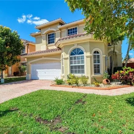 Buy this 4 bed house on 2052 Northwest 99th Avenue in Pembroke Pines, FL 33024