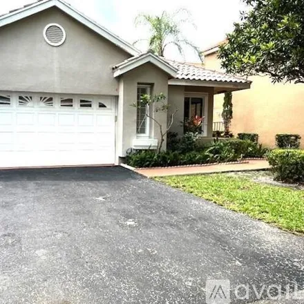 Rent this 4 bed house on 10110 NW 5th St