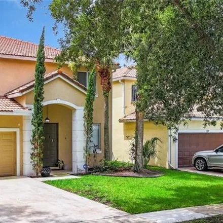 Buy this 4 bed house on 115 Seminole Lakes Dr in Royal Palm Beach, Florida