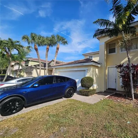 Rent this 5 bed house on 7663 Northwest 19th Street in Pembroke Pines, FL 33024