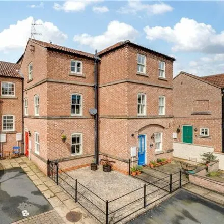 Buy this 3 bed townhouse on Stammergate Court in Ripon, HG4 1NB