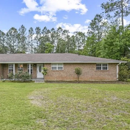 Buy this 4 bed house on 801 Herlihy Street in Waveland, MS 39576