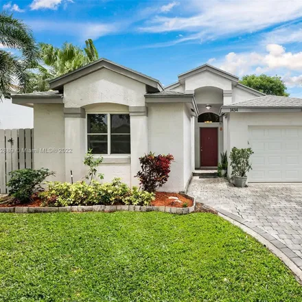 Buy this 3 bed house on 1434 Northwest 49th Avenue in Coconut Creek, FL 33063
