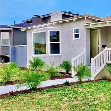 Buy this 3 bed house on 1922 West 106th Street in Los Angeles, CA 90047