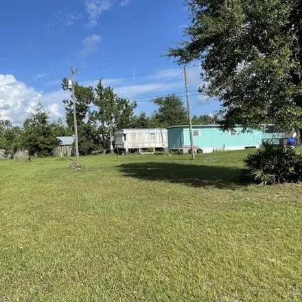 Buy this studio apartment on 8221 CR 2301 in Bay County, FL 32466