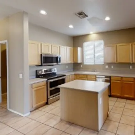 Rent this 4 bed apartment on 9610 East Monte Avenue in Augusta Ranch, Mesa