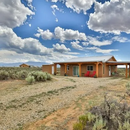 Buy this 2 bed house on 25 Red Sky Rd in El Prado, New Mexico