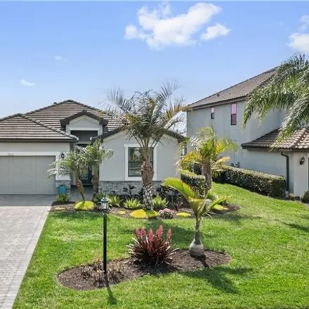 Buy this 3 bed house on 17321 Ashcomb Way in Estero, Florida