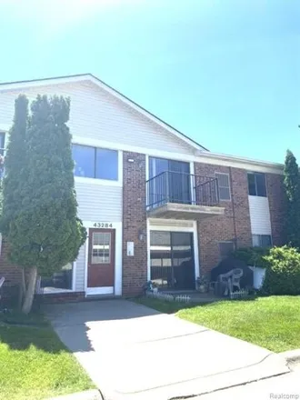 Rent this 2 bed condo on 43284 Mound Rd Apt 406 in Sterling Heights, Michigan