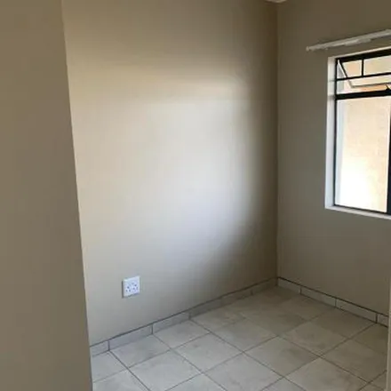 Rent this 2 bed apartment on Siderite Avenue in Fleurhof, Soweto