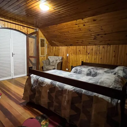 Rent this 4 bed house on Campos do Jordão in Região Metropolitana do Vale do Paraíba e Litoral Norte, Brazil
