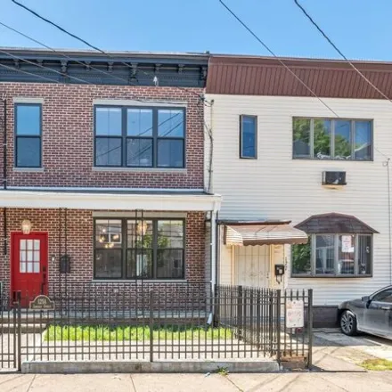 Buy this 4 bed house on 125 Lincoln Street in Jersey City, NJ 07307