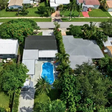 Rent this 4 bed house on 1486 Garfield Street in Hollywood, FL 33020