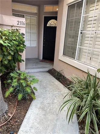Rent this 3 bed condo on 2316 Cascade in Tustin, CA 92782