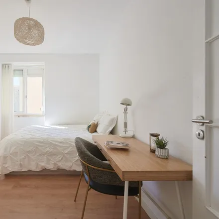 Rent this 1 bed room on Avenida São João de Deus in 1000-009 Lisbon, Portugal