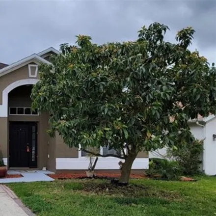 Rent this 4 bed house on 1406 Royal Saint George Drive in Orange County, FL 32828