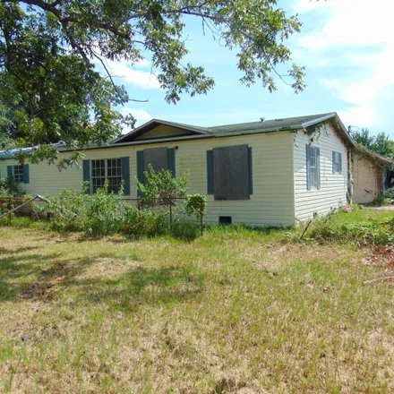 Buy this 4 bed house on 3208 East 2nd Place in Springfield, Bay County