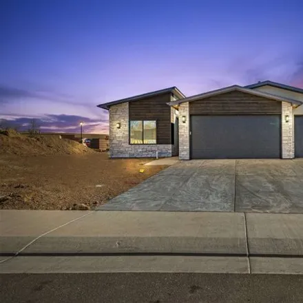 Buy this 4 bed house on 674 Tilman Drive in Grand Junction, CO 81506