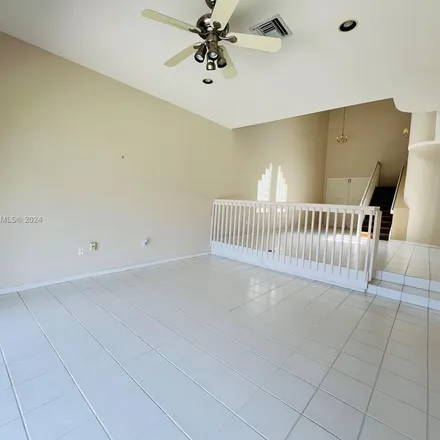 Rent this 4 bed apartment on 14730 Southwest 132nd Court in Miami-Dade County, FL 33186