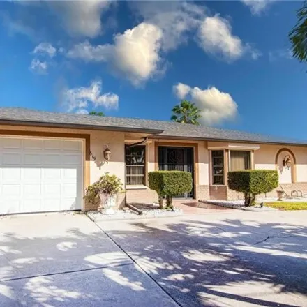 Buy this 3 bed house on 1618 Orchid Boulevard in Cape Coral, FL 33904