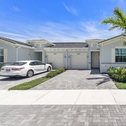 Rent this 3 bed townhouse on unnamed road in Villages of Oriole, Palm Beach County