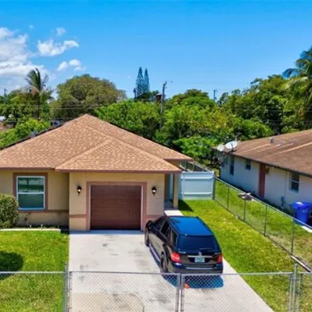 Buy this 3 bed house on 2941 Northwest 4th Court in Collier Park, Pompano Beach