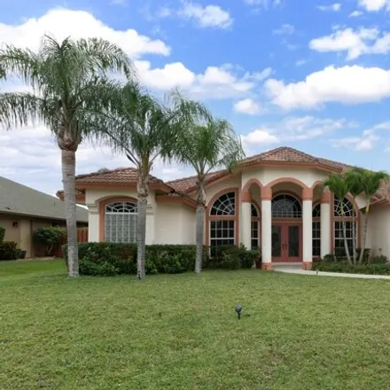 Buy this 4 bed house on 402 Southwest Jeanne Avenue in Port Saint Lucie, FL 34953