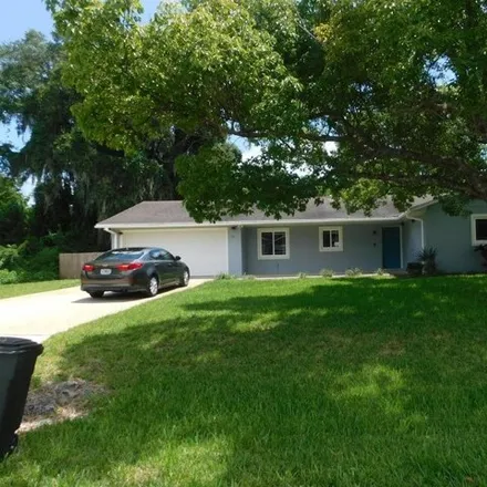 Rent this 3 bed house on 1709 Umbrella Tree Drive in Edgewater, FL 32132