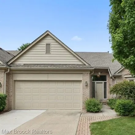 Buy this 2 bed condo on 45427 Diamond Pond Drive in Macomb Township, MI 48044
