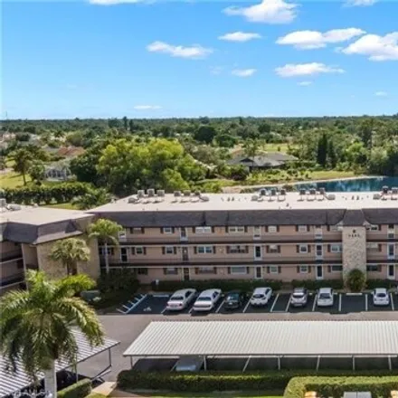 Buy this 2 bed condo on 5459 Rattlesnake Hammock Road in Lely Country Club, Collier County