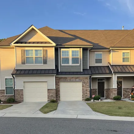 Buy this 3 bed townhouse on 7820 Weathered Oak Way in Raleigh, NC 27616