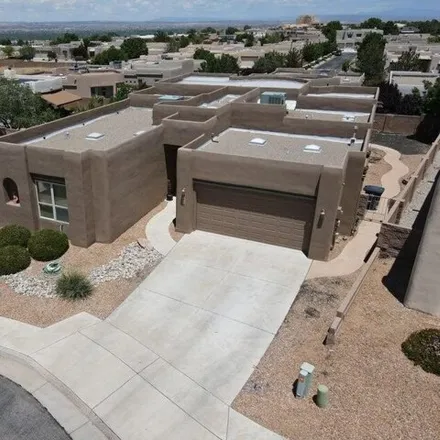 Buy this 4 bed house on 7301 Enchanted Sky Lane Northeast in Albuquerque, NM 87113