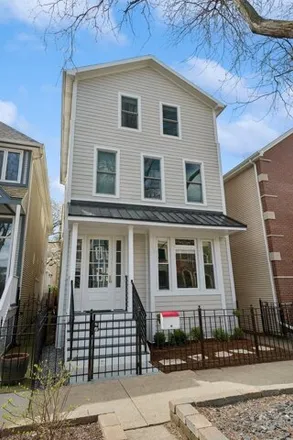 Buy this 4 bed house on 1329 West Wellington Avenue in Chicago, IL 60618