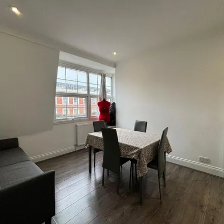 Rent this 5 bed apartment on Pound Saver in Kilburn High Road, London