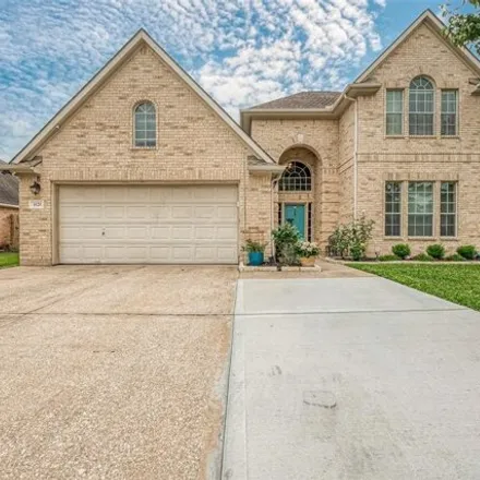 Buy this 5 bed house on 1876 Oak Lodge Drive in Pearland, TX 77581