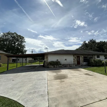 Buy this 3 bed house on 6203 Fort Pierce Boulevard in Lakewood Park, FL 34951